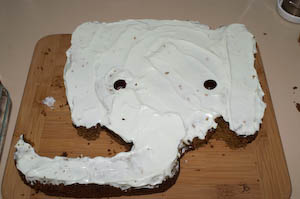 A homemade elephant birthday cake. We think homemade cake is more delicious, more fun, and less wasteful than store-bought. Athena's green birthday party was a great success. | Jennifer Margulis, Ph.D.