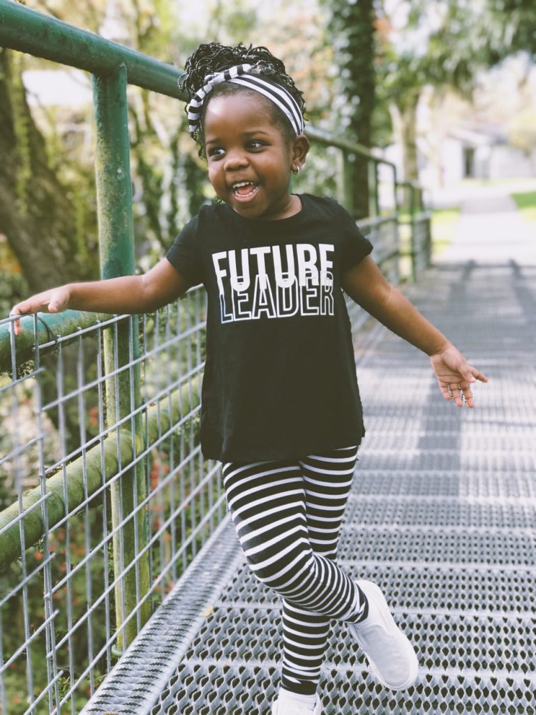Traveling with a potty training or just potty trained toddler adds a whole other dimension to your trip. Photo of a future leader courtesy of Kiana Boseman, via Unsplash. | Jennifer Margulis