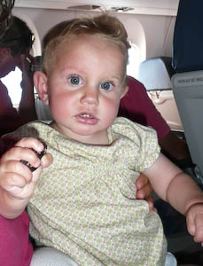 A 9-month-old on her way to BlogHer 2010.