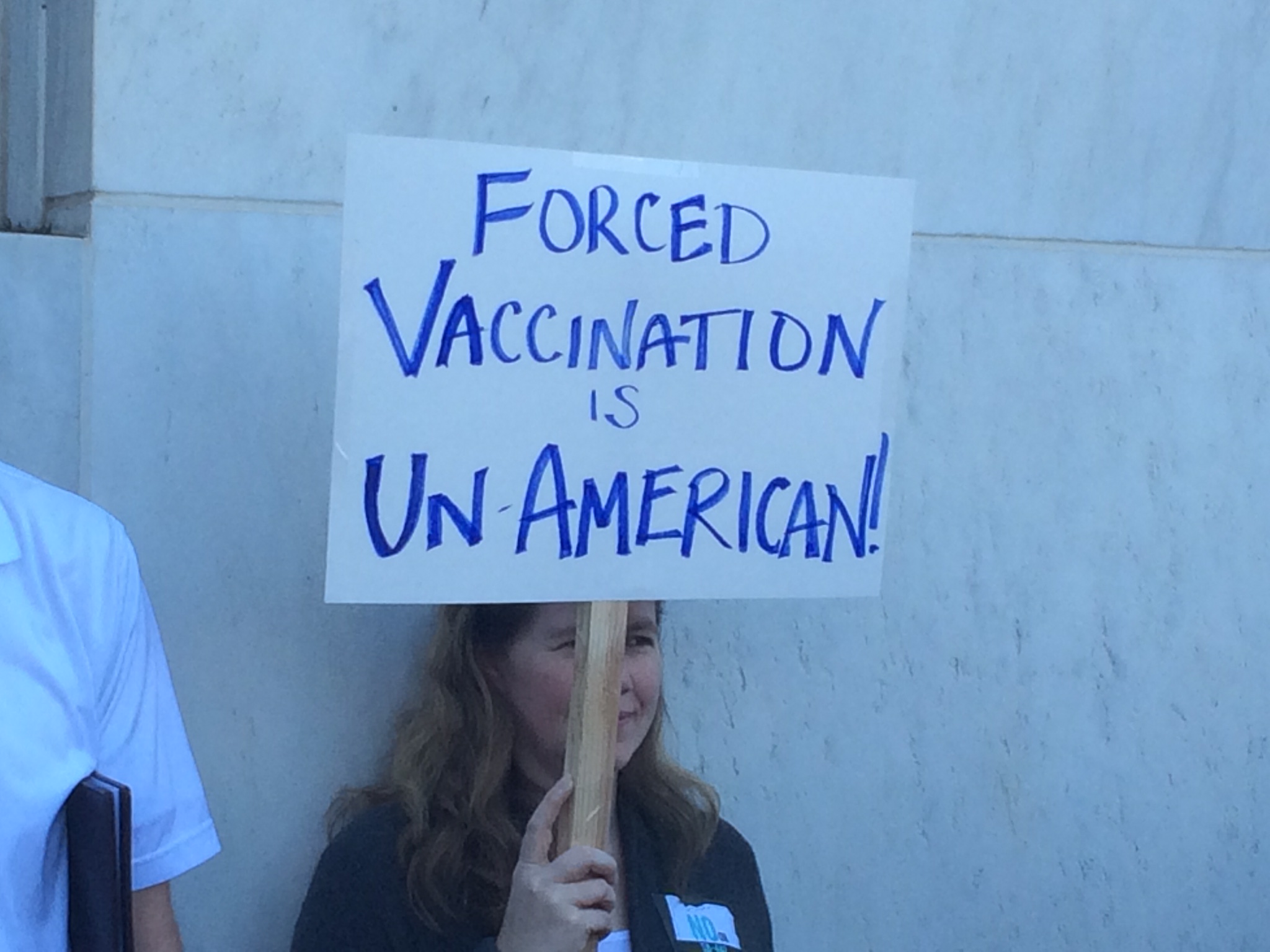 Forced vaccination is un-American. A sign at the March 9, 2015 rally in Salem