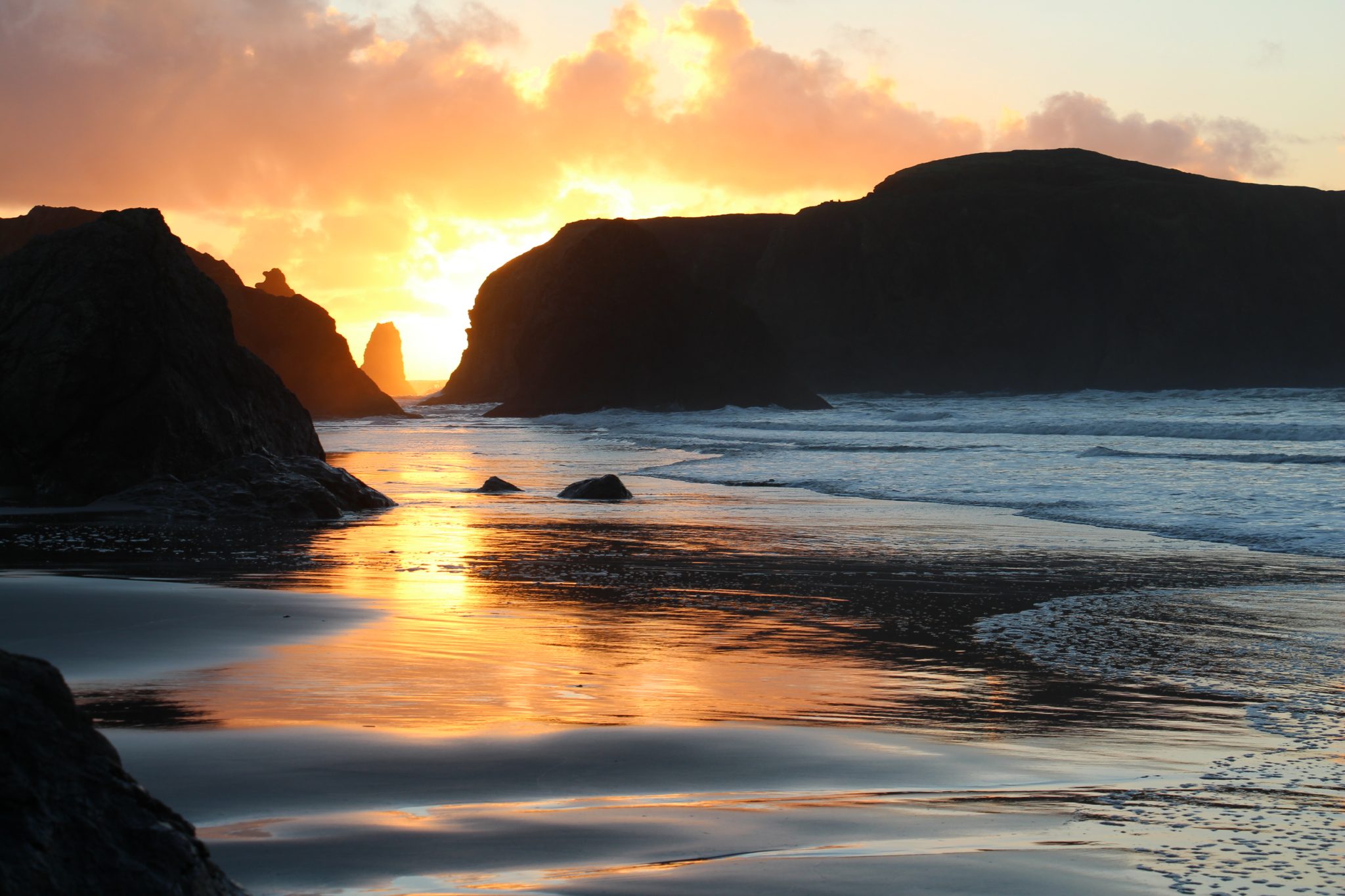 Sunset in Bandon by the Sea, Oregon seen during a writers' retreat. Photo by Sue Langston.