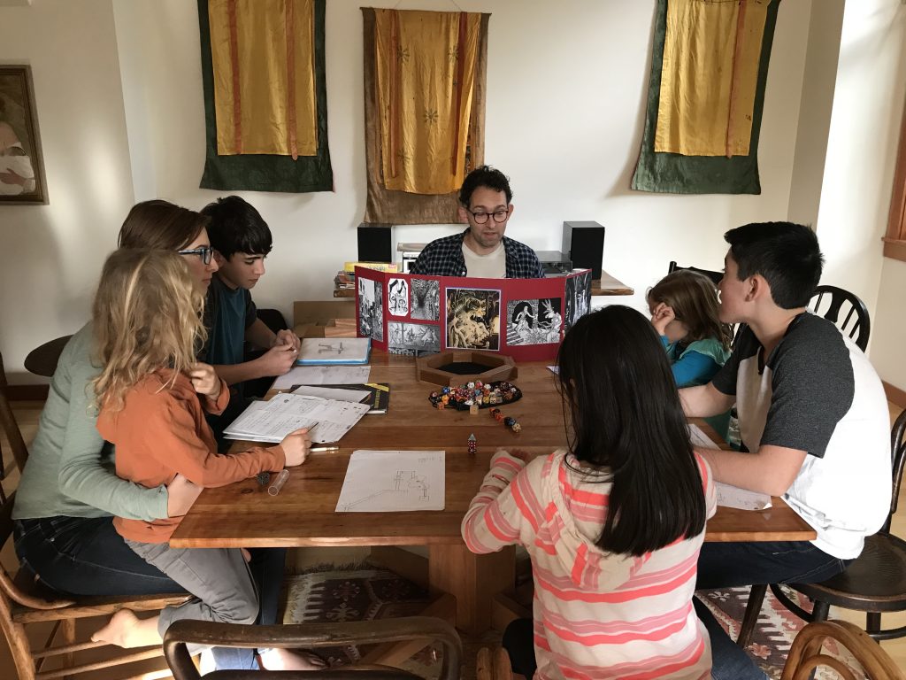 Children and teens playing Dungeons and Dragons at a happy Thanksgiving 2017. Photo via Jennifer Margulis