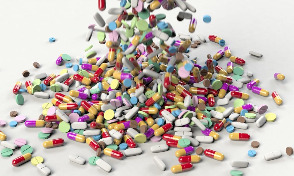 New study: Mice given influenza after taking antibiotics were more likely to die than mice not exposed to antibiotics. Antibiotics disrupt healthy gut bacteria | photo of a cascade of pills via JenniferMargulis.net
