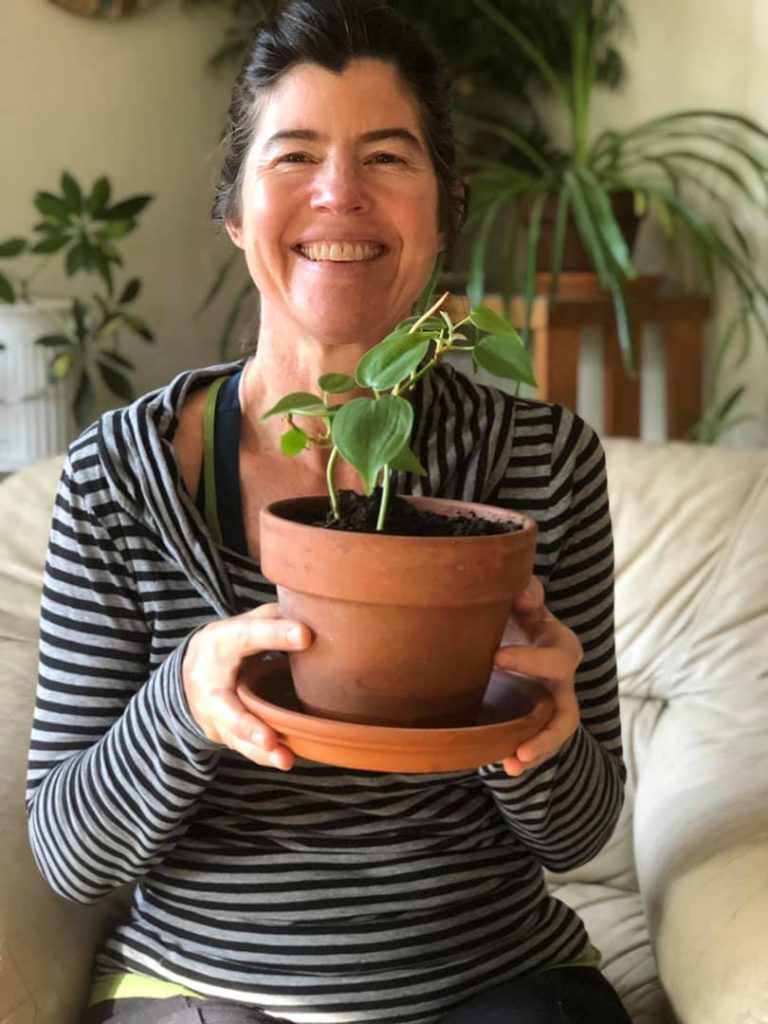 My dear friend Laura with one of my favorite houseplants. Try giving away the things you love the most. This plant was hard to part with but the joy it is bringing to my friend brings me so much happiness 