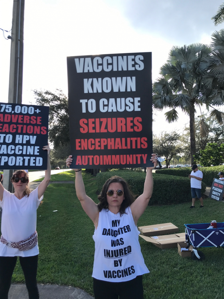 Vaccine education activists hold signs to educate Oprah about the safety of vaccines | Jennifer Margulis
