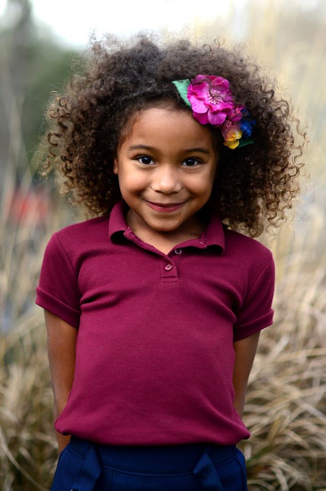 An African-American girl wearing a maroon shirt and a big smile. Felicia Leggio Braud photo. Unvaccinated children are healthier than their vaccinated counterparts. Why? | Jennifer Margulis, Ph.D.